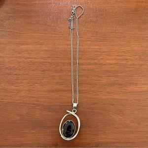 Sterling silver with black stone